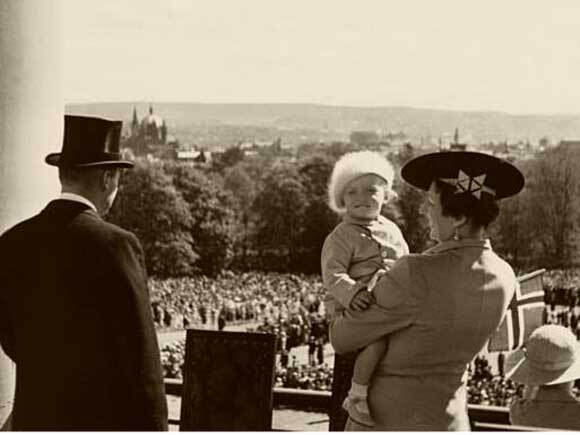 King Harald on the Palace Balcony for the first time - 17 May 1938. Unknown photographer, the Royal Collections